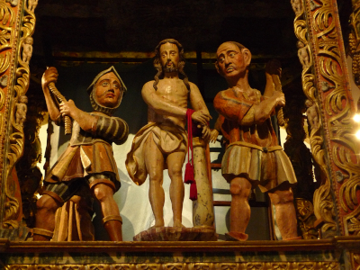 Igrexa de Santa Cruz de Baldomar. Flaxelación de Cristo na parte traseira do retablo maior